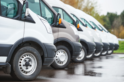 transporting services company vans in a row